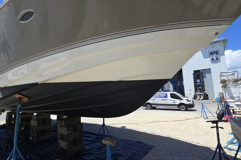 Slide: The Image of 2007 Cruisers Yachts 447 Sport Sedan on dry dock for maintenance. - 6