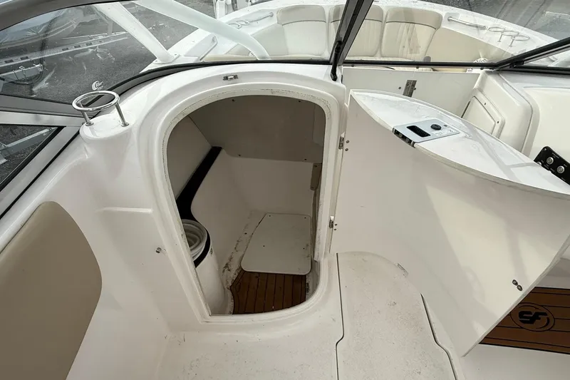 Slide: The Image of 2019 Sea Fox 226 Traveler boat interior with open storage compartment. - 11