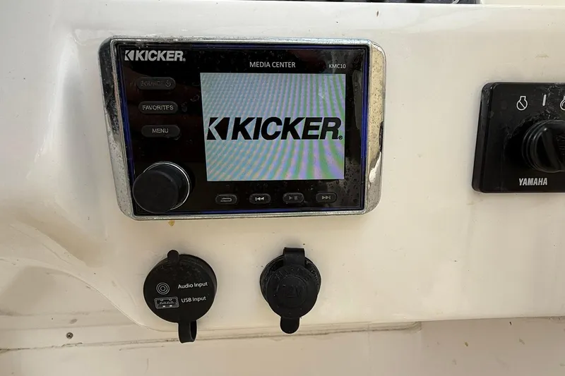 Slide: The Image of Kicker media center on 2019 Sea Fox 226 Traveler boat dashboard with Yamaha controls. - 9