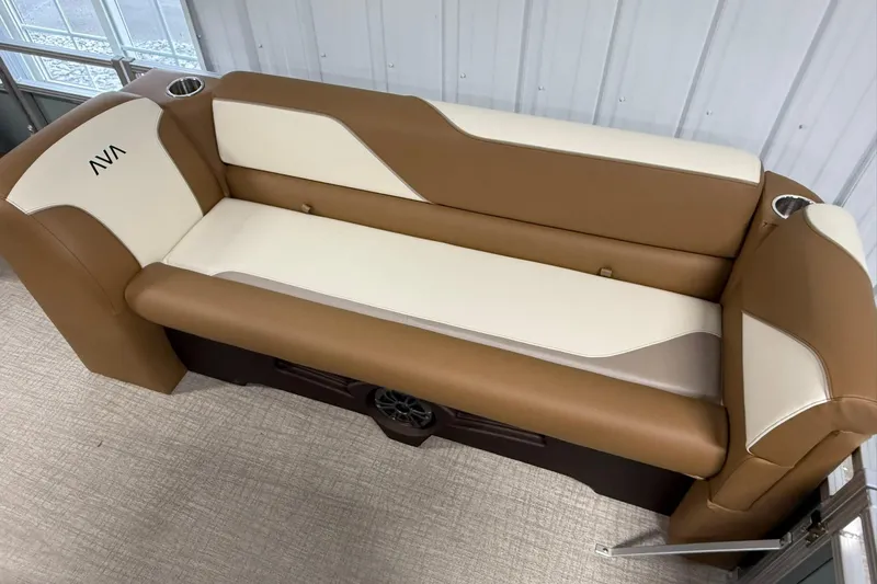 Slide: The Image of 2026 Avalon Venture Quad Lounge boat seat, brown and cream upholstery, cup holders, modern design. - 13