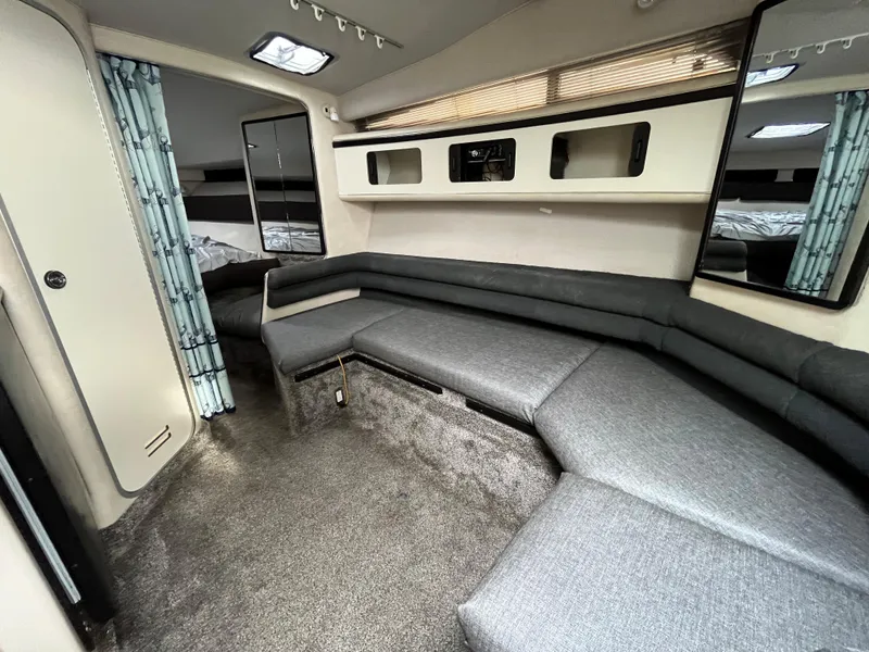 Slide: The Image of Interior of 1993 Sea Ray 330 Express with gray upholstery. - 15