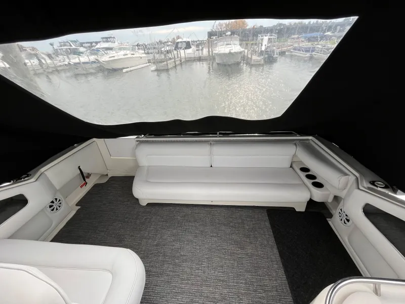 Slide: The Image of Interior of a 1993 Sea Ray 330 Express with harbor view. - 7