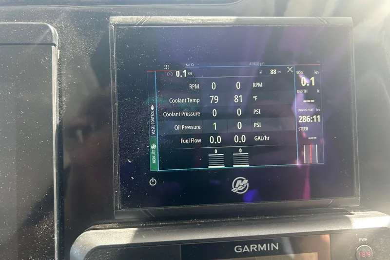 Slide: The Image of Garmin display on 2022 Beneteau Antares 9 showing engine metrics and navigation data. - 40