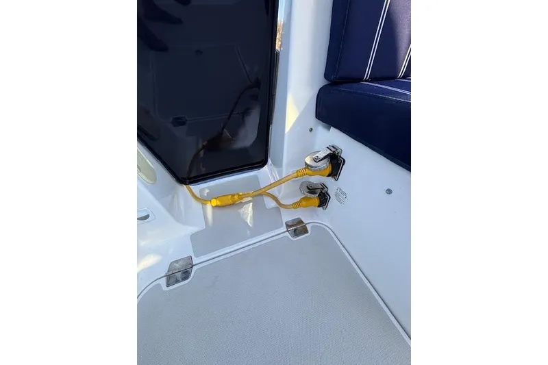 Slide: The Image of 2018 Back Cove 30 boat interior with electrical connections and seating. - 41