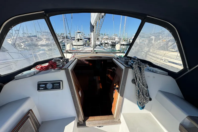 Slide: The Image of Cockpit view of 1989 Catalina 42 sailboat docked at marina. - 18