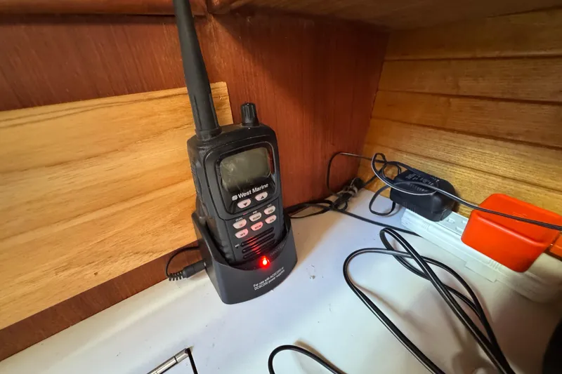 Slide: The Image of Handheld marine radio charging on a Catalina 42 sailboat, 1989 model. - 24
