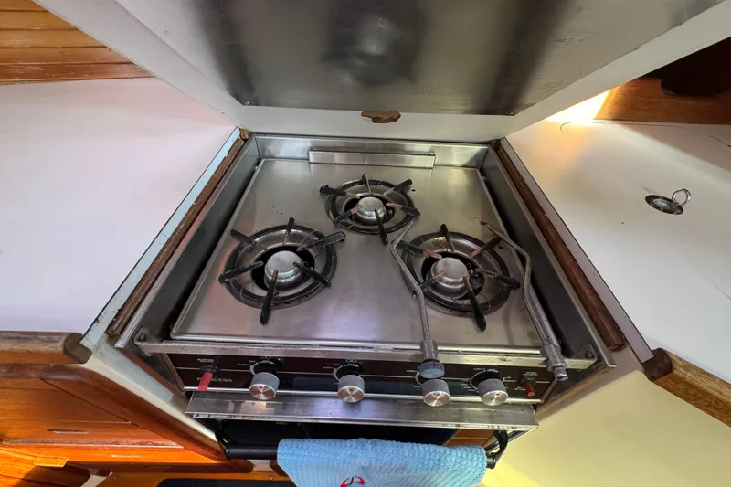 Slide: The Image of Three-burner stove in 1989 Catalina 42 yacht kitchen. - 39