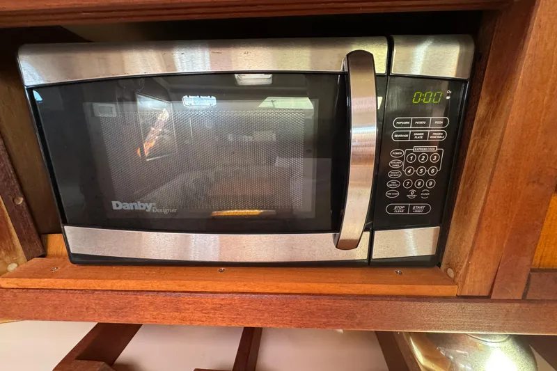 Slide: The Image of Danby Designer microwave in a 1989 Catalina 42 yacht kitchen setting. - 40