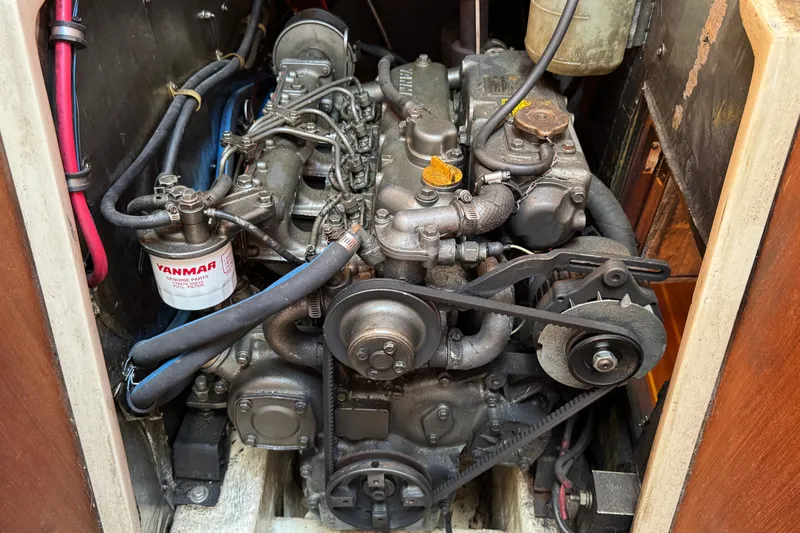 Slide: The Image of Engine compartment of a 1989 Catalina 42 sailboat with Yanmar diesel engine. - 47