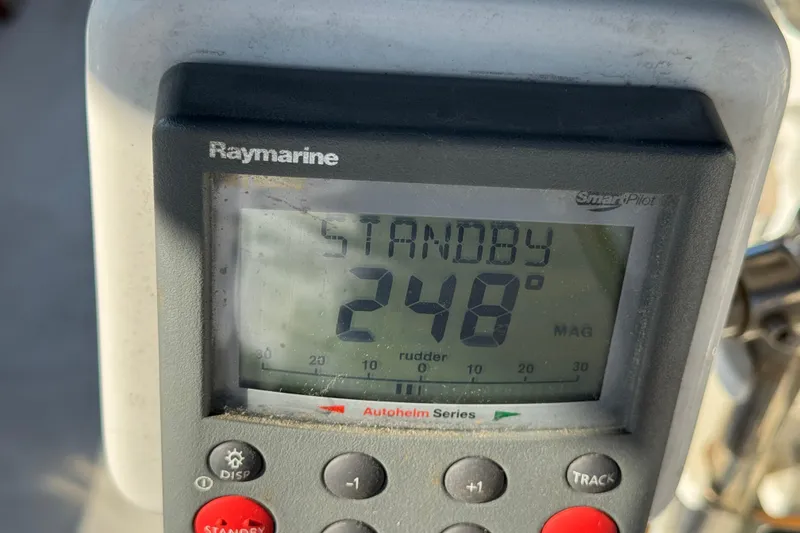 Slide: The Image of Raymarine SmartPilot display on Catalina 42, 1989, showing standby mode at 248 degrees. - 7