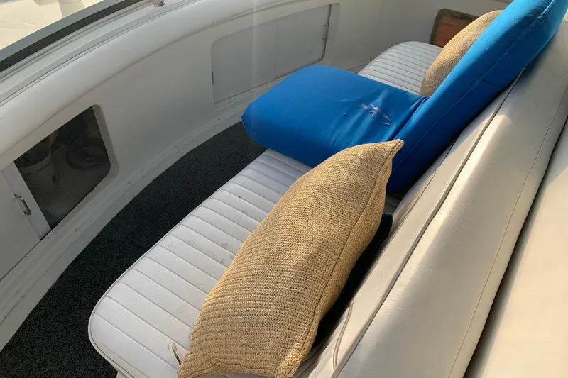 Slide: The Image of Interior seating of 1994 Carver 440 Aft Cabin Motor Yacht with cushions. - 14