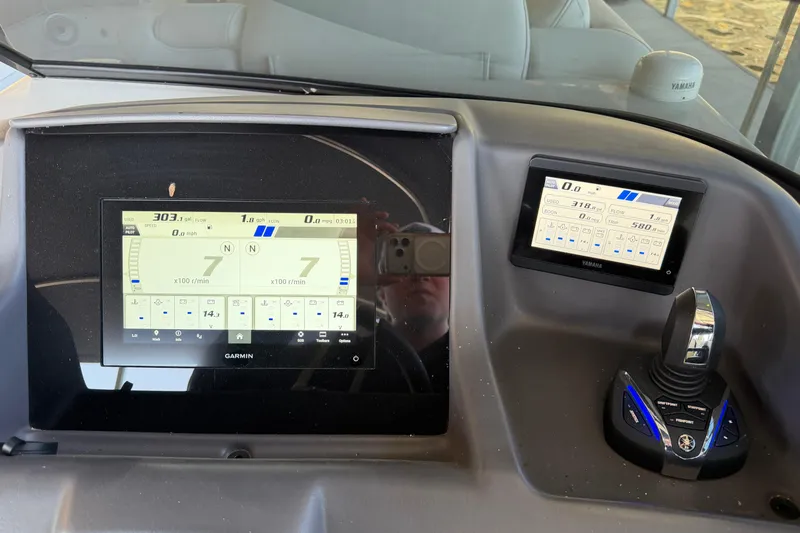 Slide: The Image of Dashboard of 2023 Bennington QX 30 QXFBWA X2 Wide Beam with Garmin and Yamaha displays. - 12