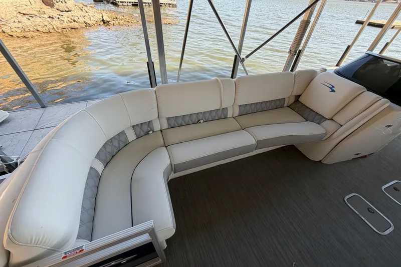 Slide: The Image of Luxurious seating on 2023 Bennington QX 30 QXFBWA X2 Wide Beam pontoon boat. - 26