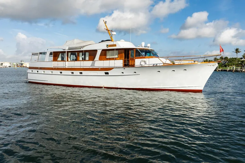 The Image of Classic 1972 Trumpy 72 Motor Yacht cruising on a sunny day. - 0