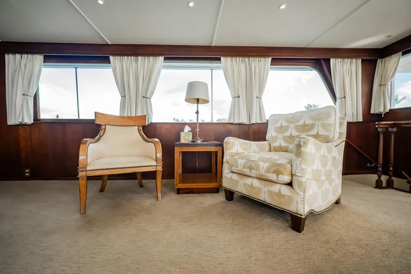 Slide: The Image of Luxurious interior of 1972 Trumpy 72 Motor Yacht with elegant seating and decor. - 15