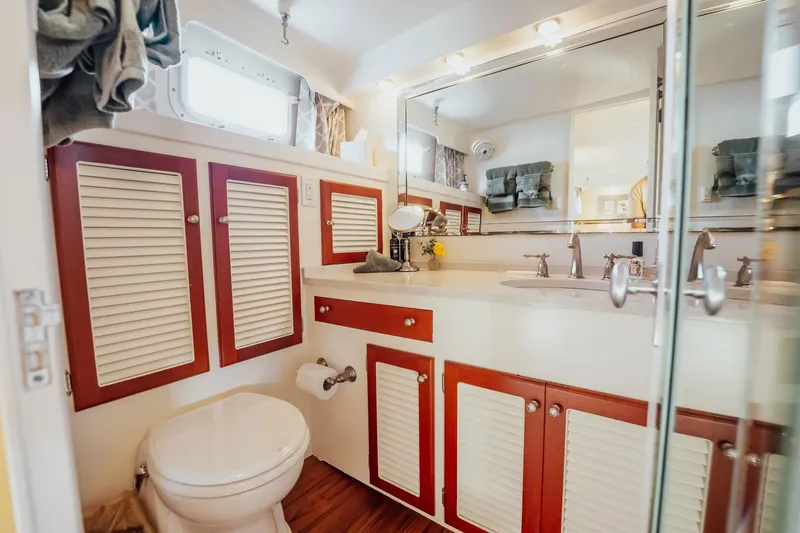Slide: The Image of Luxurious bathroom on a 1972 Trumpy 72 Motor Yacht with elegant cabinetry and fixtures. - 32