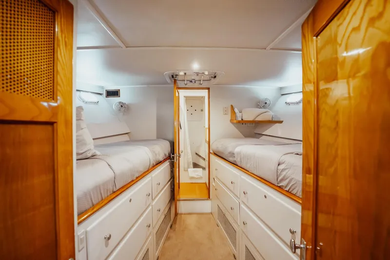 Slide: The Image of Interior of 1972 Trumpy 72 Motor Yacht with twin beds and wooden cabinetry. - 40