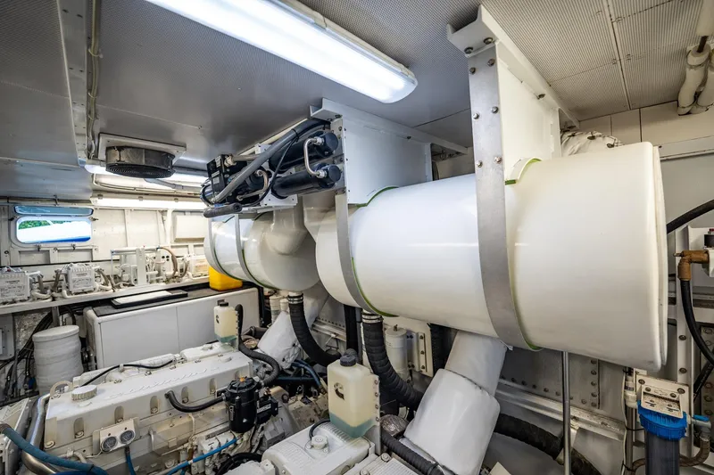 Slide: The Image of Engine room of a 1972 Trumpy 72 Motor Yacht, showcasing machinery and equipment. - 44