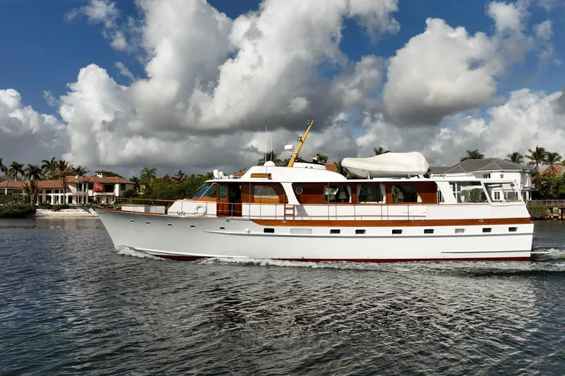 Slide: The Image of Classic 1972 Trumpy 72 Motor Yacht cruising on a sunny day. - 6