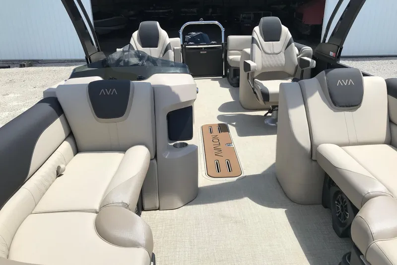 Slide: The Image of 2026 Avalon LSZ Quad Lounge Tri Log boat interior with luxurious seating and modern design. - 11