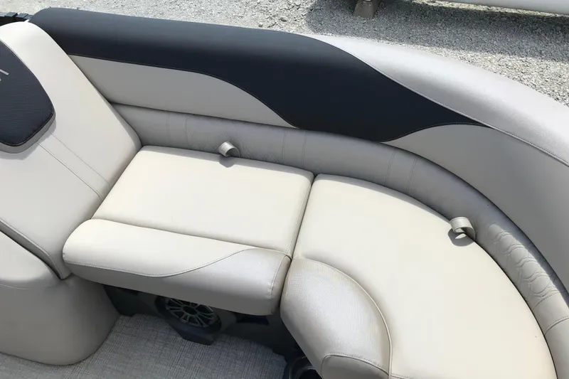 Slide: The Image of Luxurious seating on 2026 Avalon LSZ Quad Lounge Tri Log boat, featuring elegant upholstery design. - 12