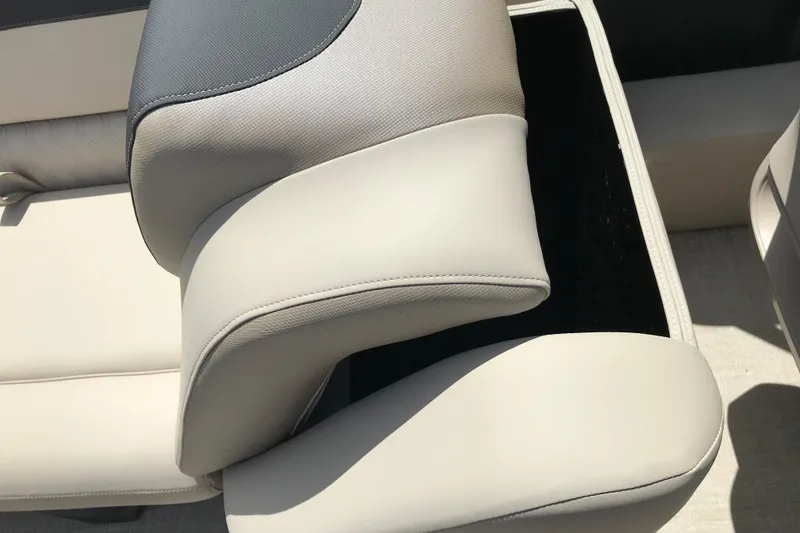 Slide: The Image of 2026 Avalon LSZ Quad Lounge Tri Log seat with storage compartment, featuring sleek beige upholstery. - 26