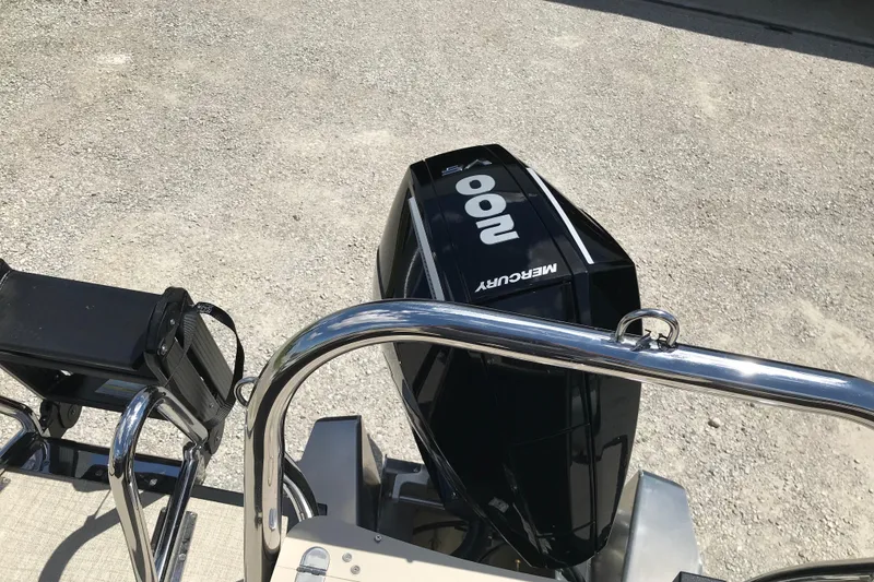 Slide: The Image of 2026 Avalon LSZ Quad Lounge Tri Log with Mercury 100 outboard motor. - 28