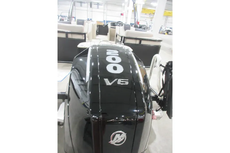 Slide: The Image of 2026 Avalon LSZ Quad Lounge Tri Log with powerful 200 V6 engine in showroom. - 3