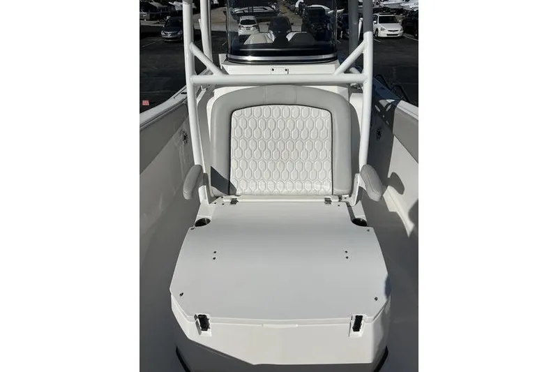 Slide: The Image of 2022 Sea Fox 288 Commander boat seating area with white cushioned backrest. - 12