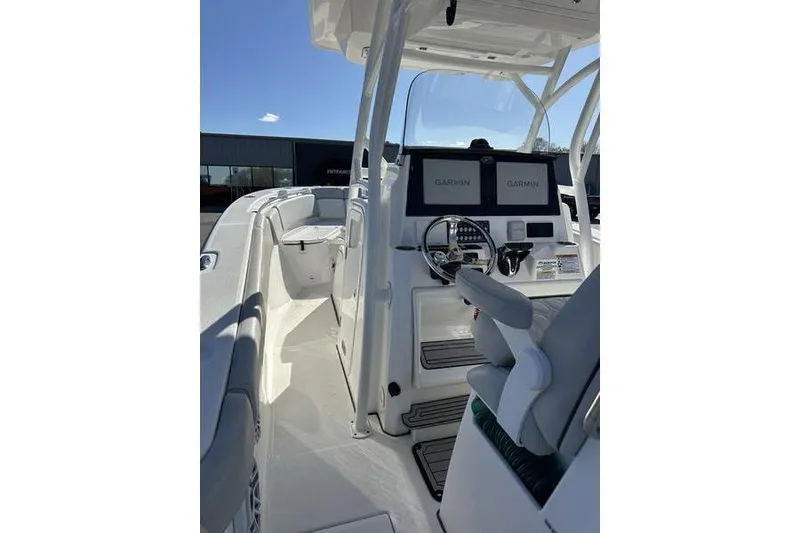 Slide: The Image of 2022 Sea Fox 288 Commander boat interior with Garmin navigation displays. - 7