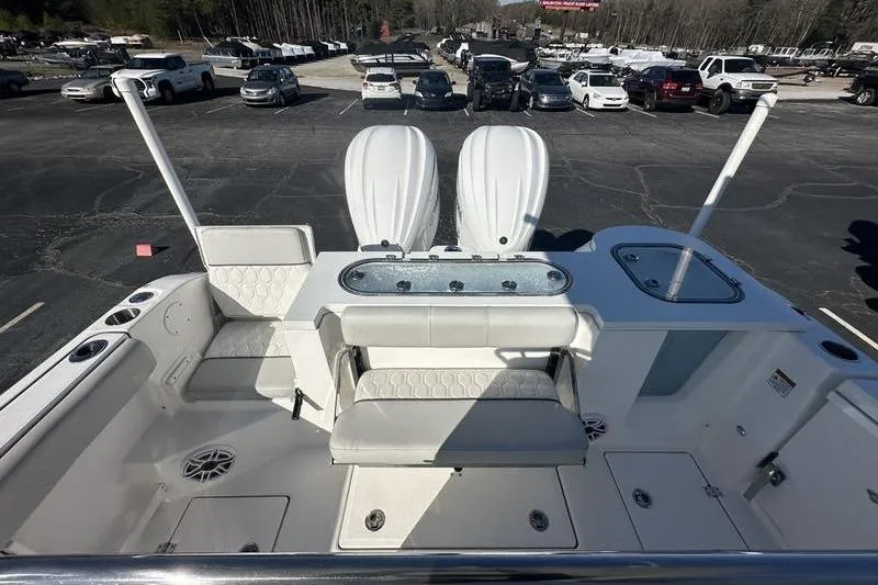 Slide: The Image of 2022 Sea Fox 288 Commander boat interior with seating and storage compartments. - 9