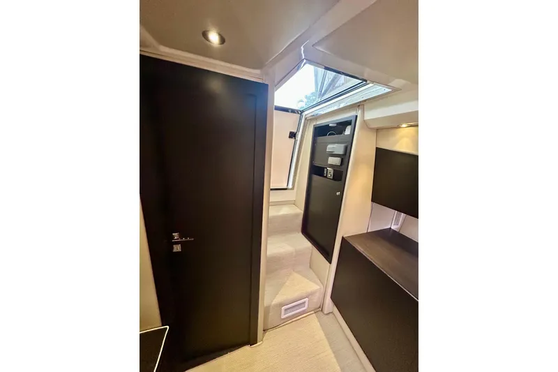 Slide: The Image of Interior of 2013 Azimut Atlantis Verve Outboard yacht, featuring modern design and sleek cabinetry. - 75