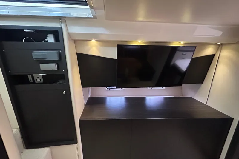 Slide: The Image of Interior of 2013 Azimut Atlantis Verve Outboard with TV and storage cabinets. - 79