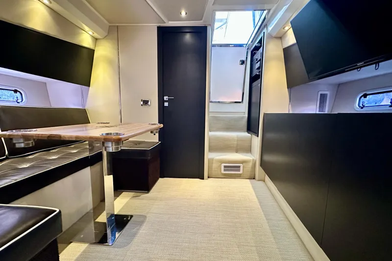 Slide: The Image of Interior of 2013 Azimut Verve 40 yacht with modern seating and table. - 81