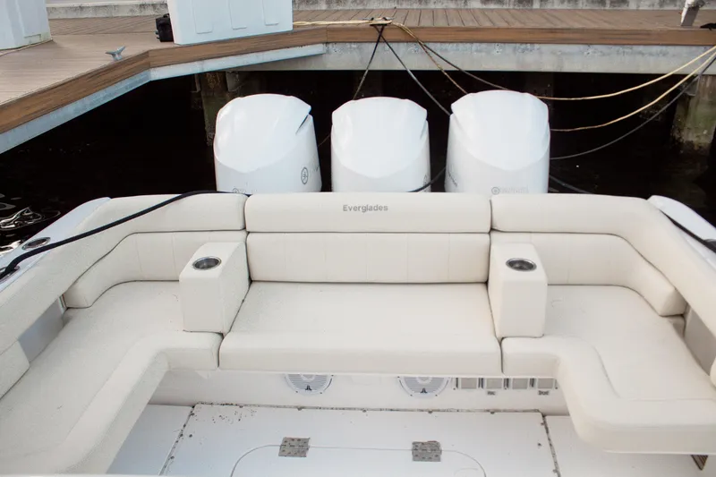 Slide: The Image of Luxury seating on 2017 Everglades 360 LXC boat with triple outboard engines. - 11