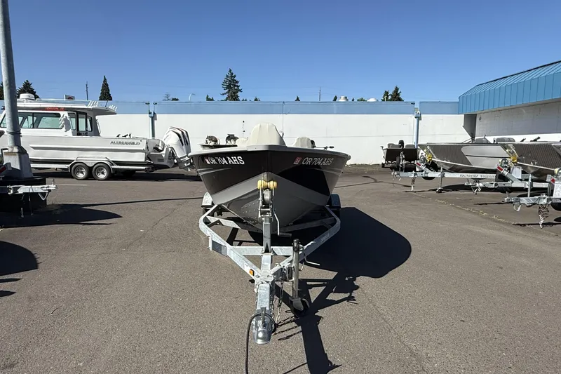 Slide: The Image of 2022 Smoker Craft Freedom 160 SC boat on trailer in parking lot. - 3