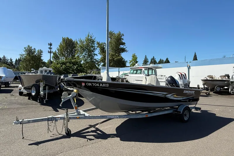 Slide: The Image of 2022 Smoker Craft Freedom 160 SC boat on trailer in outdoor lot. - 4