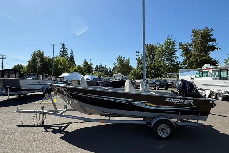 Slide: The Image of 2022 Smoker Craft Freedom 160 SC boat on trailer in outdoor dealership lot. - 5