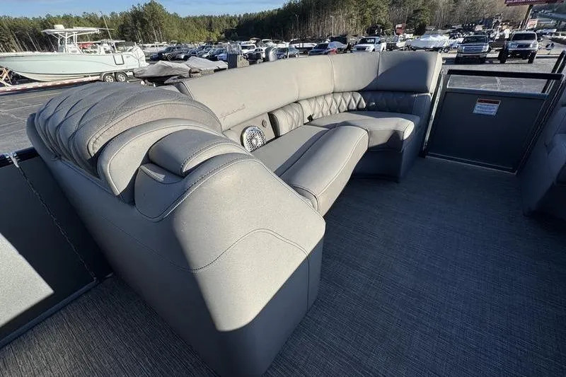 Slide: The Image of Luxurious seating on 2024 Bennington 25 QXSBA pontoon boat, showcasing spacious and comfortable design. - 6