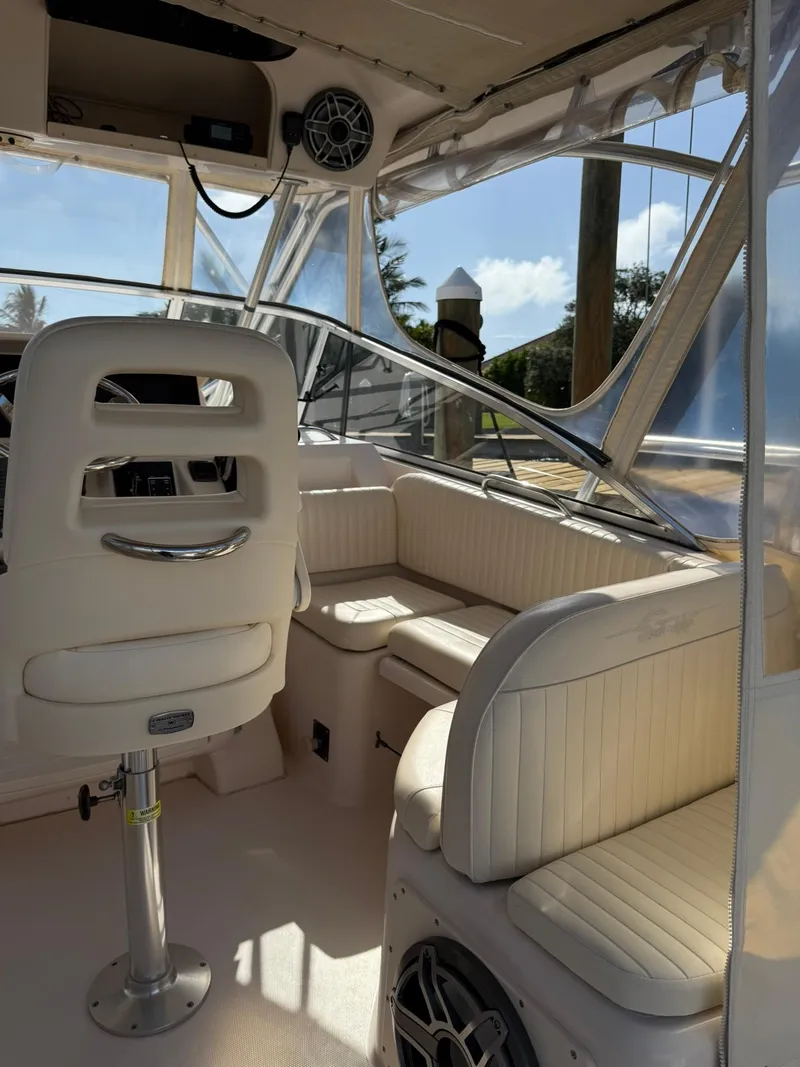 Slide: The Image of 2007 Grady-White Express 330 boat interior with seating and helm. - 32