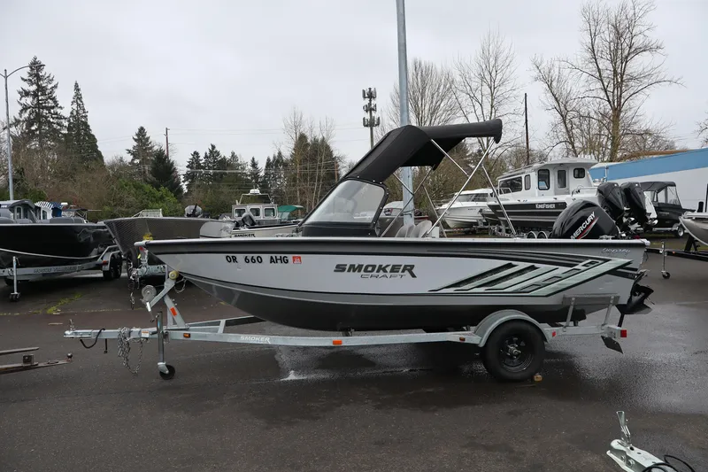 The Image of 2021 Smoker Craft Osprey 162 boat on trailer, parked outdoors. - 1