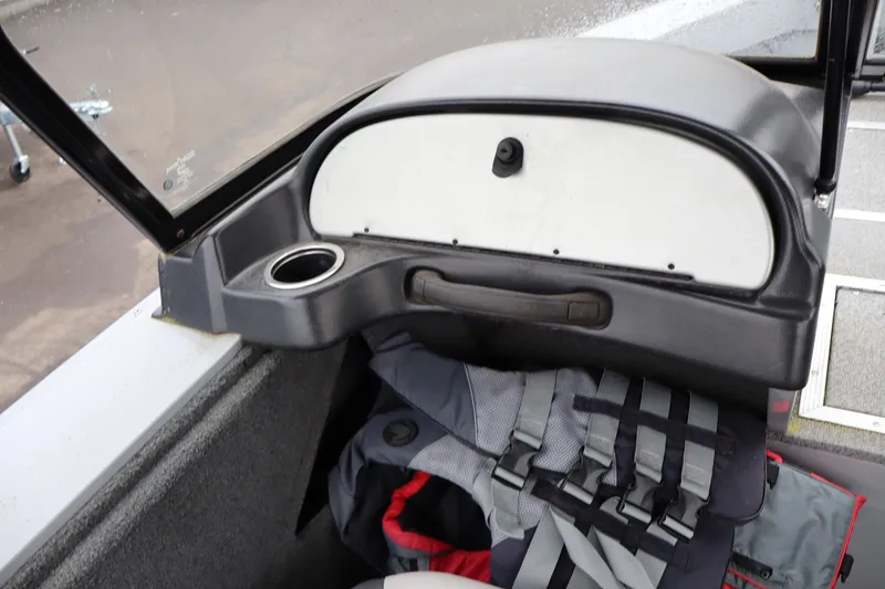 Slide: The Image of 2021 Smoker Craft Osprey 162 boat interior with storage compartment and life jacket. - 11