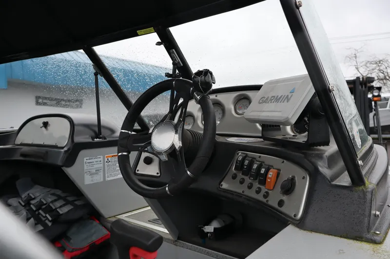 Slide: The Image of 2021 Smoker Craft Osprey 162 boat dashboard with Garmin navigation system. - 8