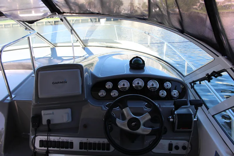 Slide: The Image of Helm of 2005 Cruisers Yachts 340 Express with Garmin navigation system. - 10
