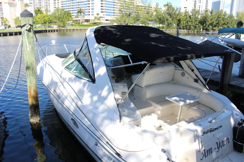 Slide: The Image of 2005 Cruisers Yachts 340 Express docked in a marina. - 4
