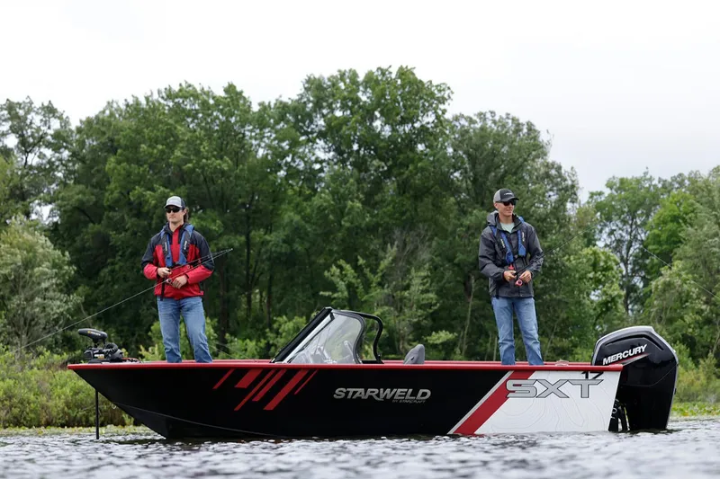 The Image of Manufacturer Provided Image: 2025 Starweld 16 SXT boat with two people fishing on a lake. - 0