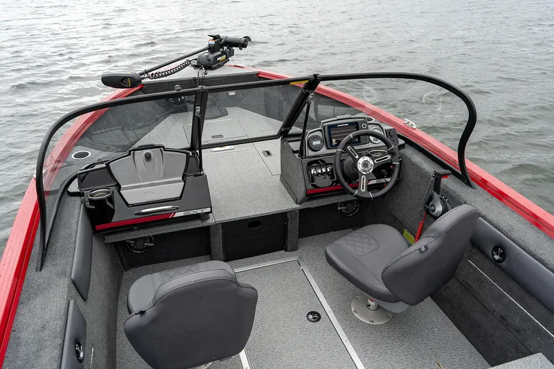 Slide: The Image of Manufacturer Provided Image: 2025 Starweld 16 SXT boat interior with modern dashboard and seating on water. - 4