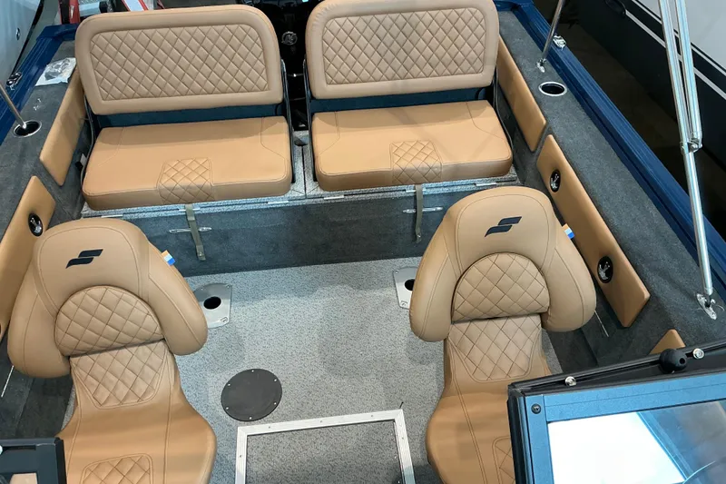 Slide: The Image of Luxurious interior of 2026 Starweld 16 SXT boat with tan quilted seating. - 9