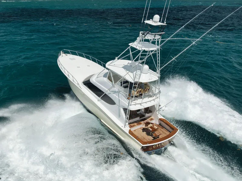 The Image of 2009 Hatteras 60GT yacht cruising on open ocean waters. - 0