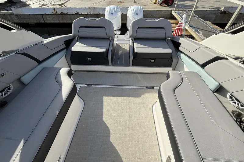 Slide: The Image of 2024 Regal LX9 boat interior with spacious seating and modern design. - 12
